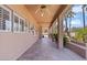 Covered patio with tile flooring and ceiling fan at 580 N Benson Ln, Chandler, AZ 85224