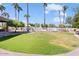 Large grassy backyard with a pool and gazebo at 580 N Benson Ln, Chandler, AZ 85224