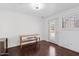 Bright home office with wood floors and built-in desk at 580 N Benson Ln, Chandler, AZ 85224