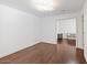 Home office with wood floors and access to another room at 580 N Benson Ln, Chandler, AZ 85224
