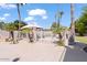 Inviting pool area with gazebo and white fence at 580 N Benson Ln, Chandler, AZ 85224