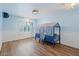 bedroom with playful decor and wood floors at 580 N Benson Ln, Chandler, AZ 85224