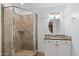 Bathroom boasts a shower, granite vanity, and tiled flooring at 580 N Benson Ln, Chandler, AZ 85224
