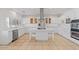 Modern kitchen with white cabinets and island at 580 N Benson Ln, Chandler, AZ 85224