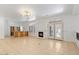 Open living area with wet bar, fireplace, and french doors at 580 N Benson Ln, Chandler, AZ 85224