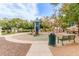 Community playground with playset and seating at 15402 W Old Oak Ln, Surprise, AZ 85379