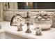 Elegant bathroom sink with crystal knobs and decorative accents at 11179 E Honda Bow Rd, Scottsdale, AZ 85262