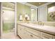 Double vanity bathroom with a large mirror and shower at 11179 E Honda Bow Rd, Scottsdale, AZ 85262