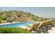 Stunning pool with mountain views and lounge chairs at 11179 E Honda Bow Rd, Scottsdale, AZ 85262