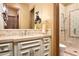Small bathroom with shower and decorative tile at 11179 E Honda Bow Rd, Scottsdale, AZ 85262