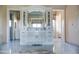 Bathroom with large vanity, soaking tub, and marble flooring at 11179 E Honda Bow Rd, Scottsdale, AZ 85262