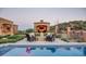Expansive pool area with cabana and fire pit at 11179 E Honda Bow Rd, Scottsdale, AZ 85262