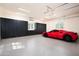 Spacious garage with ample storage and epoxy floor at 11179 E Honda Bow Rd, Scottsdale, AZ 85262