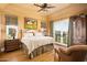 Bedroom with king-size bed and access to balcony at 11179 E Honda Bow Rd, Scottsdale, AZ 85262