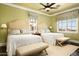 Guest bedroom with two twin beds and mountain views at 11179 E Honda Bow Rd, Scottsdale, AZ 85262