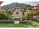 Outdoor oasis with fireplace and mountain views at 11179 E Honda Bow Rd, Scottsdale, AZ 85262