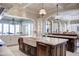 Spacious kitchen with two islands, custom cabinetry, and marble countertops at 11179 E Honda Bow Rd, Scottsdale, AZ 85262