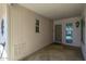 Front entry with stone flooring and a security door at 12620 W Parkwood Dr, Sun City West, AZ 85375