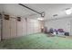 Garage with built-in storage and room for cars at 12620 W Parkwood Dr, Sun City West, AZ 85375