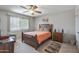 Guest bedroom with wooden bed frame at 12620 W Parkwood Dr, Sun City West, AZ 85375
