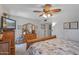 Main bedroom with large dresser and ceiling fan at 12620 W Parkwood Dr, Sun City West, AZ 85375