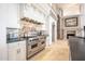 Bright kitchen features professional-grade Viking range and stylish backsplash at 5400 E Valle Vista Rd # 6, Phoenix, AZ 85018