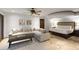 Bright bedroom with a large bed and built-in seating area at 5400 E Valle Vista Rd # 6, Phoenix, AZ 85018