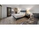 Bedroom with queen-size bed and access to balcony at 5400 E Valle Vista Rd # 6, Phoenix, AZ 85018