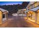 Exterior view of the home at dusk, showcasing its architectural details at 5400 E Valle Vista Rd # 6, Phoenix, AZ 85018
