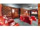Home theater with red leather seating and projector screen at 5400 E Valle Vista Rd # 6, Phoenix, AZ 85018