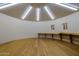 Circular workshop with wood floors and built-in shelving at 5400 E Valle Vista Rd # 6, Phoenix, AZ 85018
