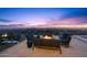 Outdoor patio with fire pit and seating area, offering stunning city views at 5400 E Valle Vista Rd # 6, Phoenix, AZ 85018