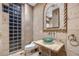 Powder room with glass block window and unique sink at 5400 E Valle Vista Rd # 6, Phoenix, AZ 85018