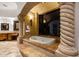Elegant bathroom with a large soaking tub and ornate columns at 5400 E Valle Vista Rd # 6, Phoenix, AZ 85018
