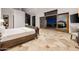 Luxurious main bedroom with sliding glass doors leading to a balcony at 5400 E Valle Vista Rd # 6, Phoenix, AZ 85018