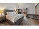 Main bedroom with king-size bed and access to balcony at 5400 E Valle Vista Rd # 6, Phoenix, AZ 85018