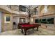 Elegant game room with pool table, aquarium, and chandelier at 5400 E Valle Vista Rd # 6, Phoenix, AZ 85018