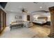 Luxurious bedroom with sitting area and access to a private balcony at 5400 E Valle Vista Rd # 6, Phoenix, AZ 85018