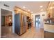 Kitchen features stainless steel appliances and tile flooring at 14213 N Bolivar Dr, Sun City, AZ 85351