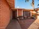 Front entrance with brick walkway and seating area at 5534 W Tierra Buena Ln, Glendale, AZ 85306