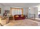Living room with tiled floors and comfortable seating at 5534 W Tierra Buena Ln, Glendale, AZ 85306