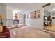 Bright living room with tile floors and views into dining area at 5534 W Tierra Buena Ln, Glendale, AZ 85306