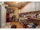 A storage or work room with cabinets and shelving units at 5534 W Tierra Buena Ln, Glendale, AZ 85306