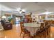 Spacious dining room with large table and access to backyard at 5534 W Tierra Buena Ln, Glendale, AZ 85306
