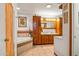 Spacious bathroom with a large soaking tub and double vanity at 5534 W Tierra Buena Ln, Glendale, AZ 85306