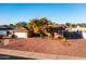 Single-story home with a large front yard and attached garage at 5534 W Tierra Buena Ln, Glendale, AZ 85306