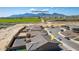 Aerial view of a house and surrounding neighborhood with mountain views at 4815 S 119Th Dr, Avondale, AZ 85323