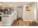 Bright entryway with light wood floors and a coat rack at 2035 S Elm St # 222, Tempe, AZ 85282