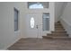 Bright entryway with staircase and front door at 15270 W Taylor St, Goodyear, AZ 85338