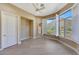 Bright bedroom with large windows offering mountain views and laminate flooring at 12943 E Corrine Dr, Scottsdale, AZ 85259